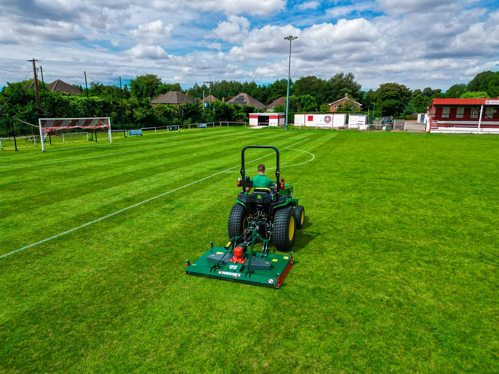 Wessex CRX-DR-12 Rotary Mower being pulled by a John Deere Tractor.