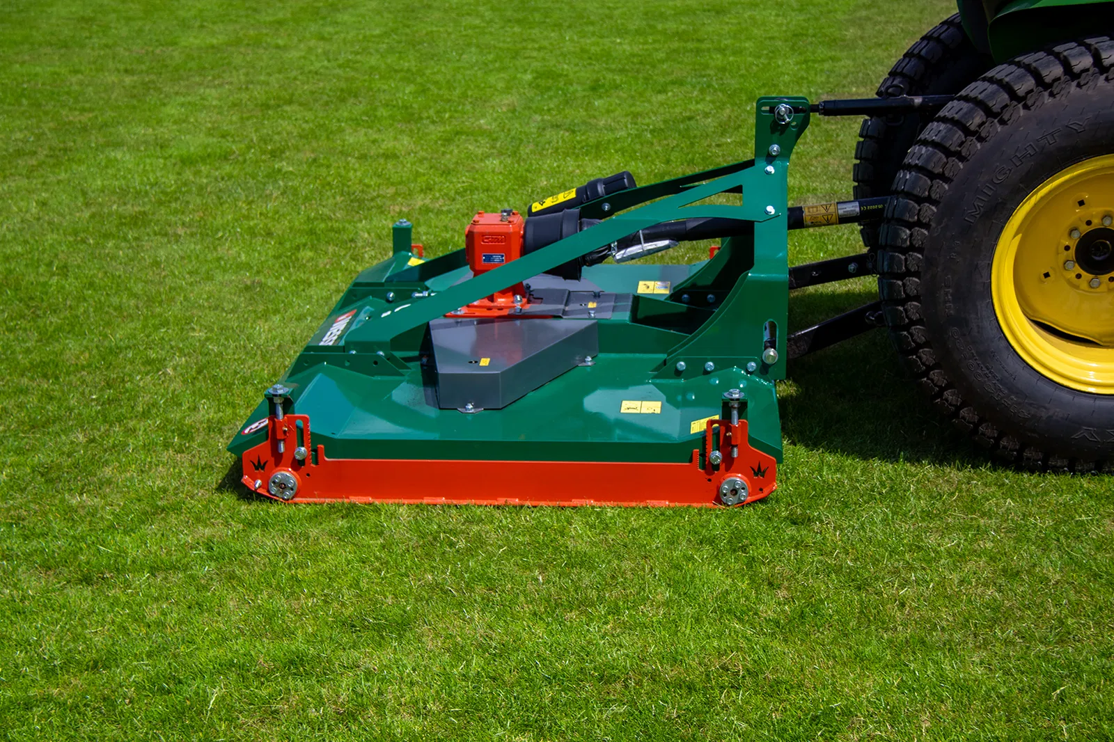 Wessex CRX-DR-12 Rotary Mower being pulled by a John Deere Tractor.