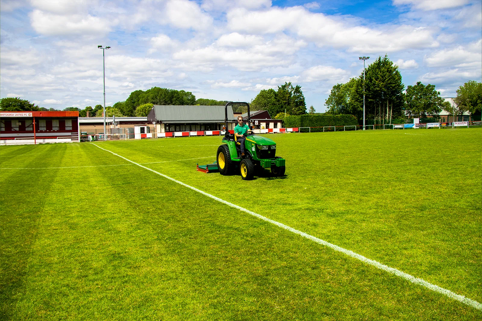 Wessex CRX-DR-12 Rotary Mower being pulled by a John Deere Tractor.