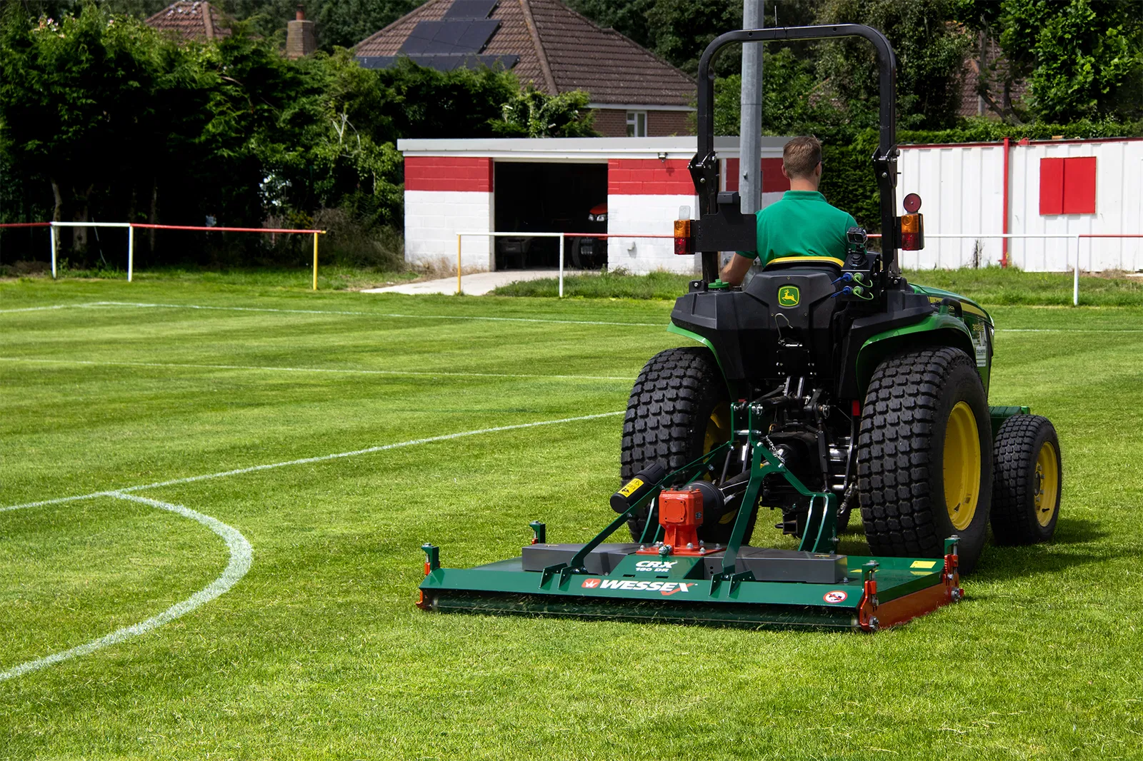 Wessex CRX-DR-12 Rotary Mower being pulled by a John Deere Tractor.